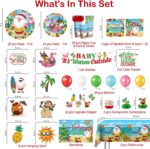 cocomigo Christmas in July party set with "Baby It's Warm Outside" banner, plates, cups, and tropical decorations.