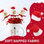 A close-up view of 30 small red and white Santa Claus hats, designed for decorating lollipops or small candies.
