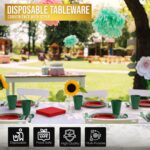 A complete set of red and green disposable party supplies, including dinner plates, appetizer plates, cups, napkins, and cutl