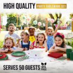 A complete set of red and green disposable party supplies, including dinner plates, appetizer plates, cups, napkins, and cutl
