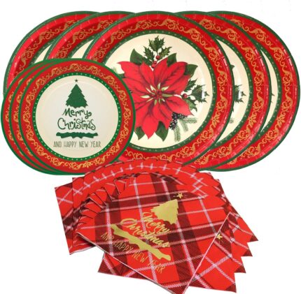 Red poinsettia patterned disposable dinner plates, dessert plates, and folded napkins for a Christmas party setting.