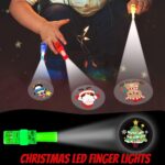 A collection of 40 assorted Christmas-themed finger lights in various colors, glowing in the dark with festive designs.
