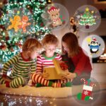 A collection of 40 assorted Christmas-themed finger lights in various colors, glowing in the dark with festive designs.