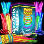A large pile of PartySticks multi-colored glow sticks and connectors, glowing brightly against a dark background.
