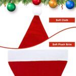 A large pile of 28 red and white plush Santa hats for adults, ready for a Christmas party.