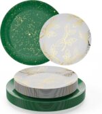 A stack of green disposable dinner plates with a subtle floral pattern, beside a stack of matching smaller dessert plates.