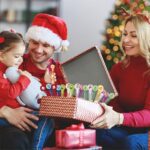 A bulk display of 40 mini bubble wands, each featuring different Christmas-themed designs like Santa, reindeer, and snowmen,